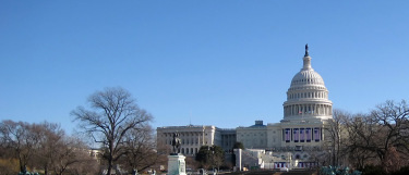 Capitol building in Washington D.C. on a sunny day with blue skies