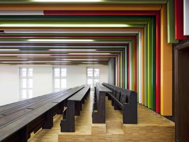 Photo of desks in lecture hall